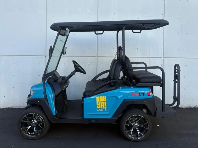 Side view of a blue four-seat HeyYa cart