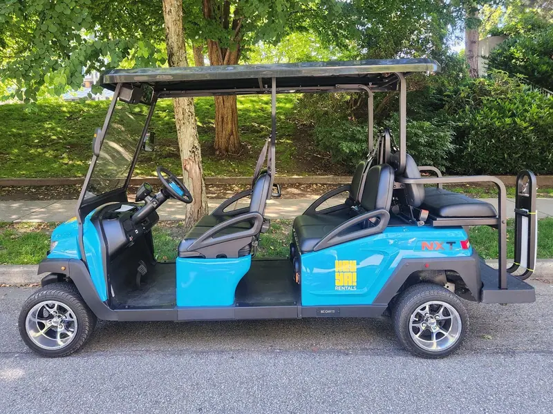 Side view of a blue six-seat HeyYa cart