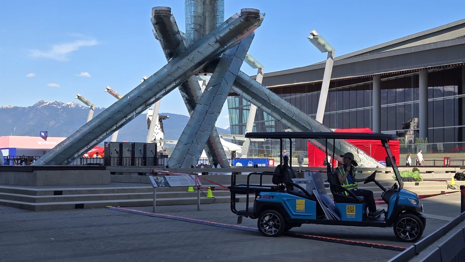 A HeyYa cart parked by the Olympic Cauldron at Jack Poole Plaza in Vancouver