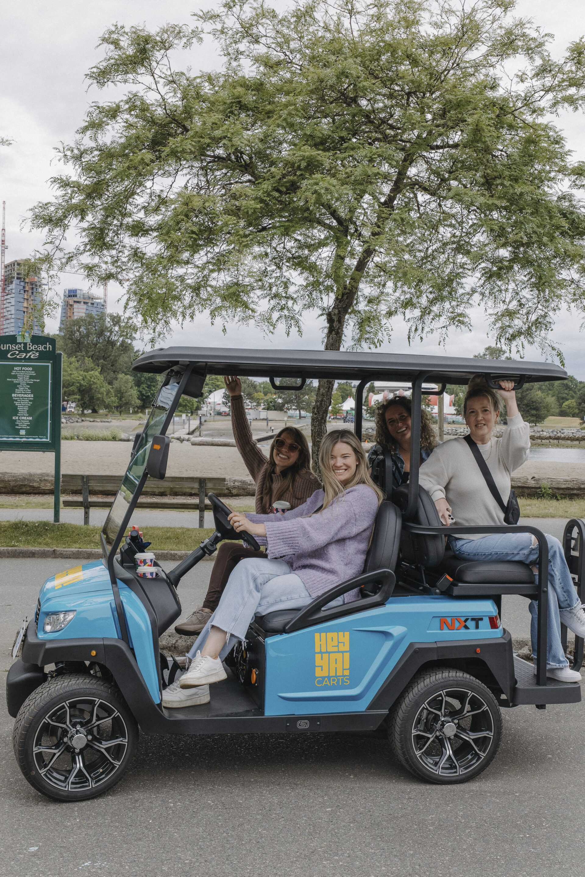 Exploring scenic forest and waterfront areas of Stanley Park with a HeyYa Cart